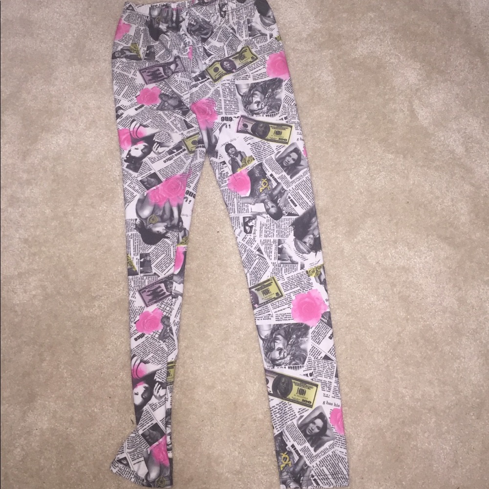 Super cute Queen newsprint leggings